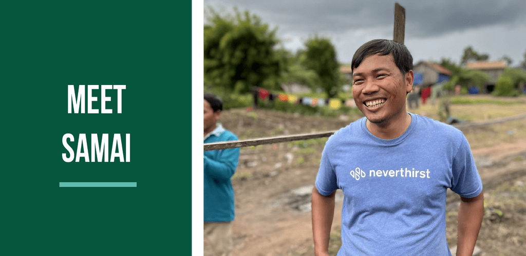 A smiling man wearing a blue neverthirst t-shirt stands outdoors by a dirt path, with greenery and houses in the background. Text on a green panel reads MEET SAMAI.